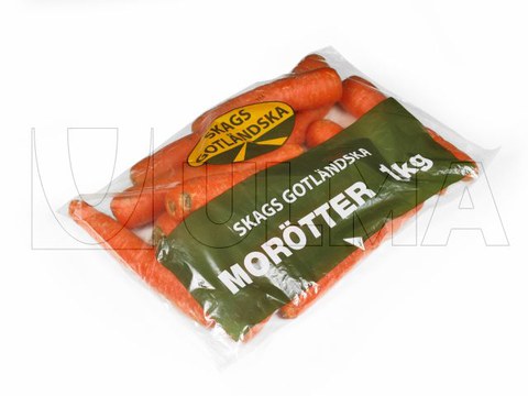 Conditionnement de Carottes en sachet "coussin" et avec du film polyéthylène.