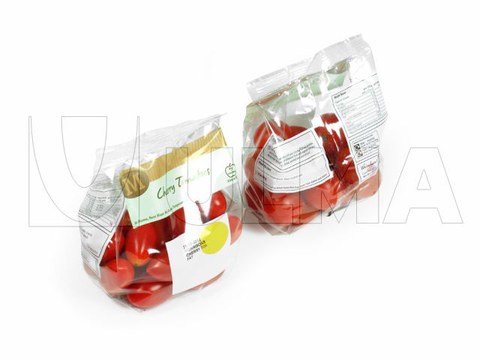 Conditionnement de tomates cerises en sachet à fond stable avec film BOPP sur une ensacheuse verticale.