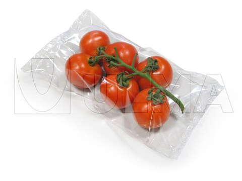 Emballage flow pack de tomates, piments et aubergines.